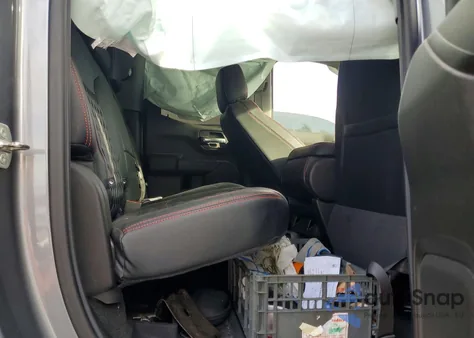 2020 Chevrolet Silverado K1500 Trail Boss Custom z USA, uszkodzony, nr VIN 1GCRYCEF2LZ129873